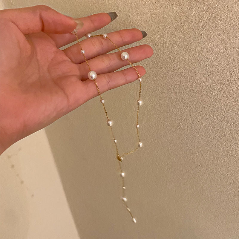 Elegant collarbone chain, small and fresh titanium steel, starry sky, pearl, simple tassel, versatile, personalized necklace for women